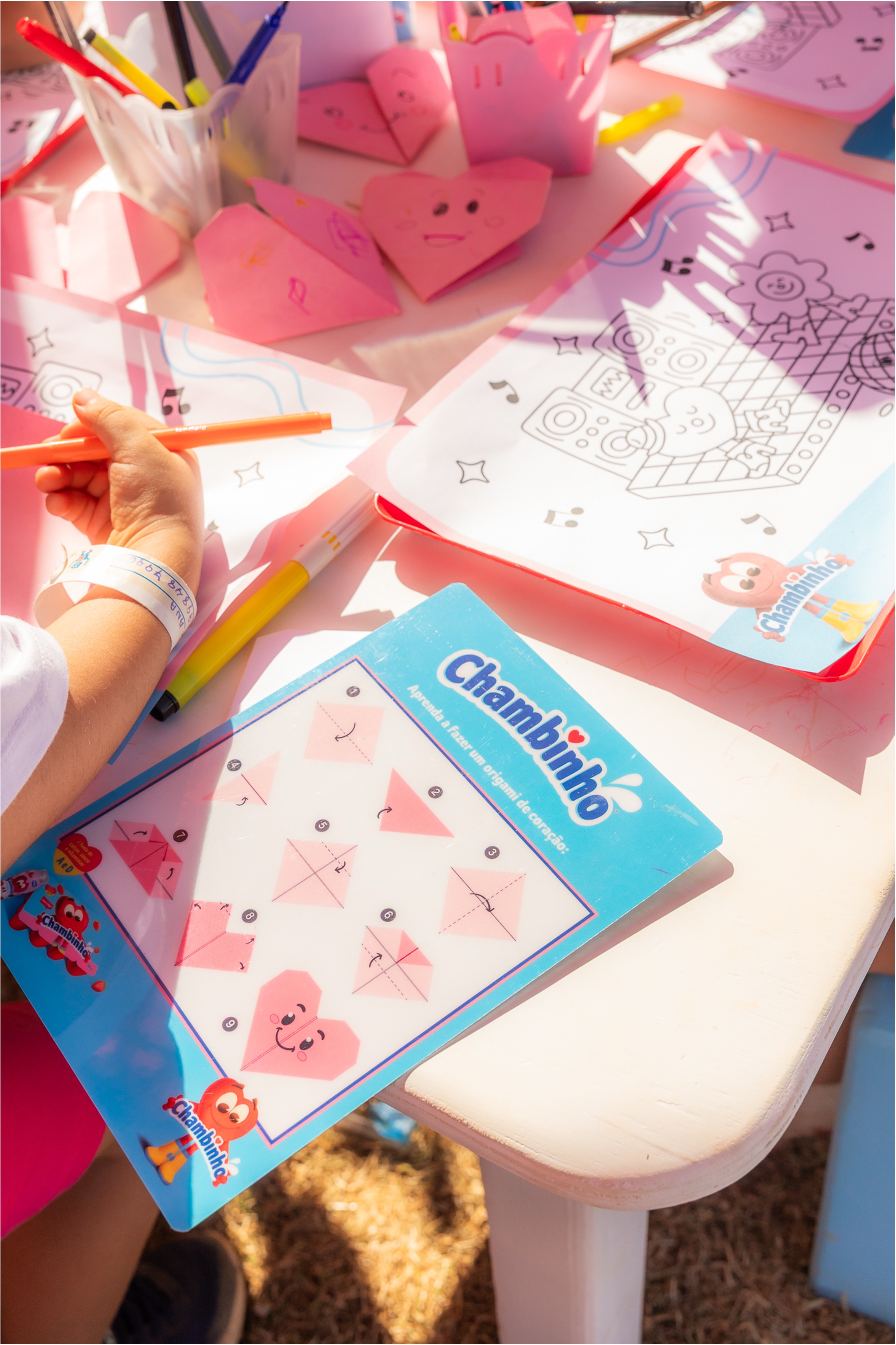 Children taking part in a Chambinho folding activity