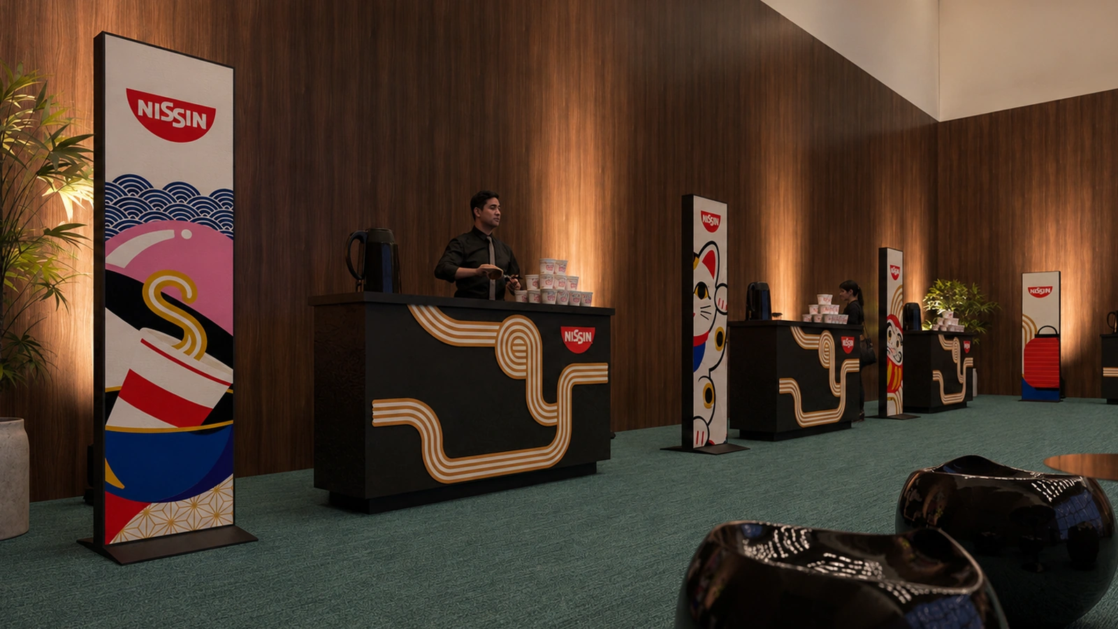 Closer perspective of tasting counters with gold noodle-line graphics and product displays
